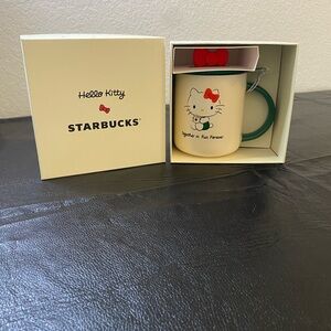 Starbucks Hello Kitty Mug with Red Bow and Green Handle